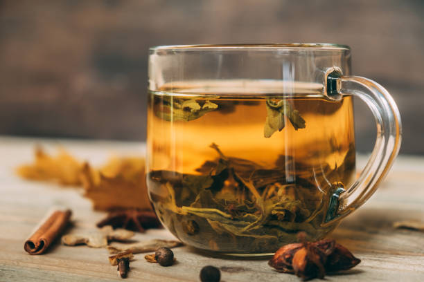 istock Green tea in a glass cup close-up. 1346252177