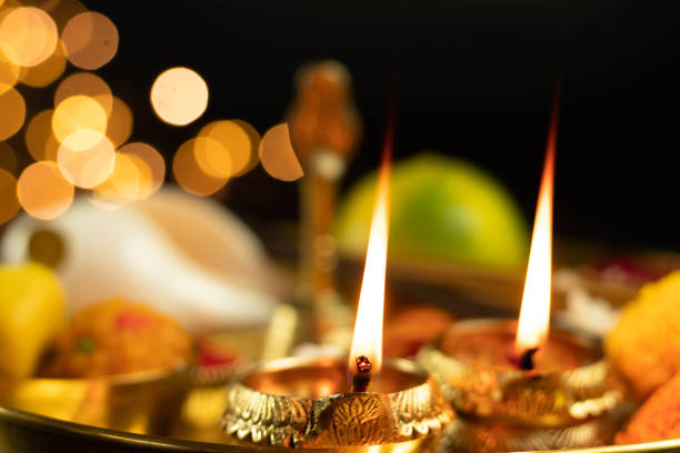 istock Illuminated Metal Brass Lamp Called Diya Deep Or Dia Glowing With Bokeh. Theme For Diwali, Navratri, Dussehra Puja, New Year, Deepawali, Karva Chauth, Teej, Ganesh Chaturthi Or Shubh Deepavali Pooja 1346254718