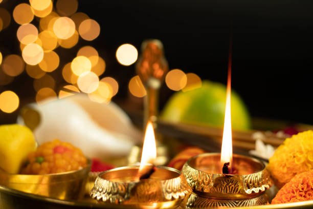 istock Illuminated Metal Brass Lamp Called Diya Deep Or Dia Glowing With Bokeh. Theme For Diwali, Navratri, Dussehra Puja, New Year, Deepawali, Karva Chauth, Teej, Ganesh Chaturthi Or Shubh Deepavali Pooja 1346254723