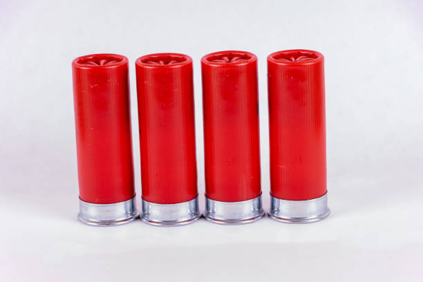 Four shotgun shells standing stock photo