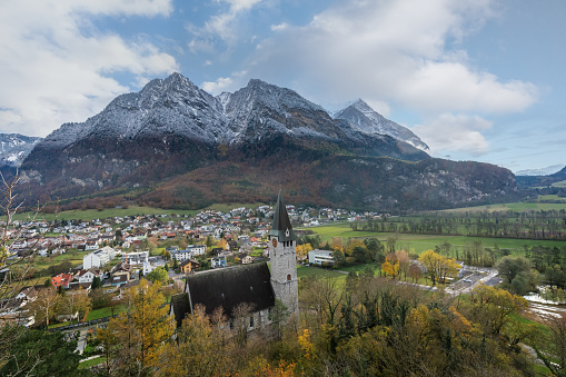 Aerial view of Balzers with church and Ratikon Mountains - Balzers, Liechtenstein