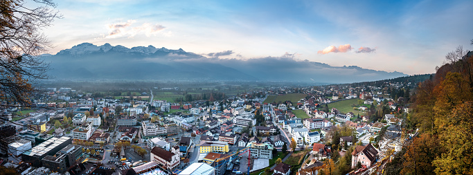 Huge Panorama of the small Austrian Village Bad Aussee covered in Snow in the middle of the Austrian Alps. You can see the alps panorama with the famous Mountains Loser, Trisselwand and Nature Reserve Totes Gebirge in back. Nikon D810. Stitched from 12 shots.