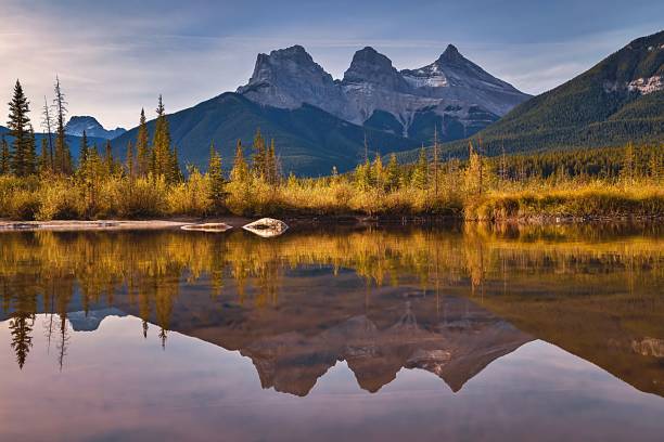 istock Sunrise Over The Three Sisters Mountains In Canmore 1346264199