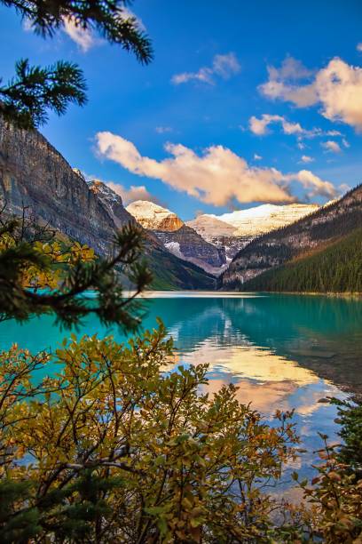 istock Autumn Foliage Framing Lake Louise 1346265261
