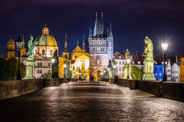 Night on Charles Bridge in Prague Night on Charles Bridge, Czech: Karluv most, with Old Town Bridge Tower, Prague, Czech Republic old town bridge tower stock pictures, royalty-free photos & images