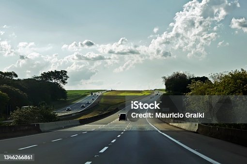 istock Driver point of view at the highway 1346266861