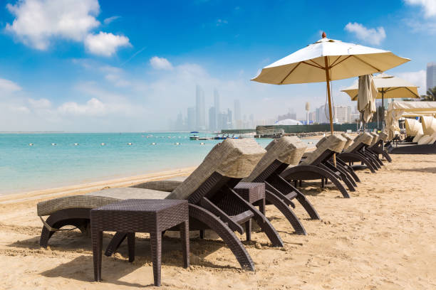 istock Sunbeds at the beach in Abu Dhabi 1346269858