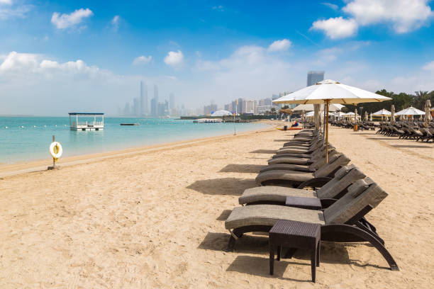 istock Sunbeds at the beach in Abu Dhabi 1346269905
