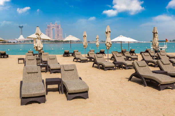 istock Sunbeds at the beach in Abu Dhabi 1346271112