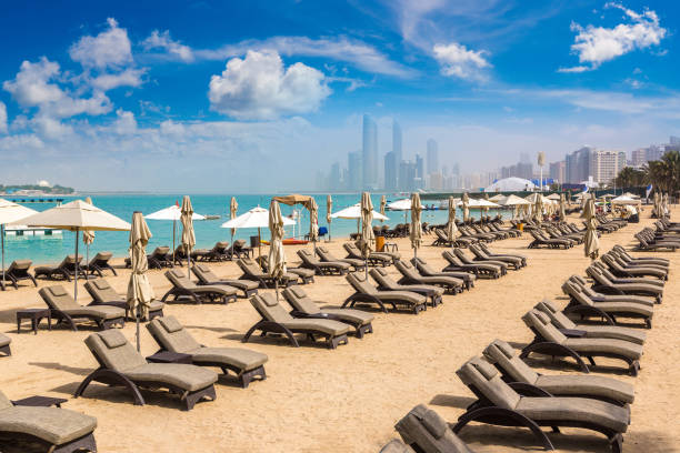 istock Sunbeds at the beach in Abu Dhabi 1346271458
