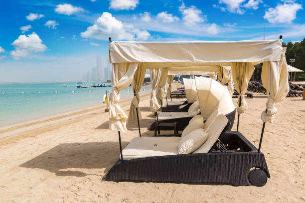 istock Sunbeds at the beach in Abu Dhabi 1346272251