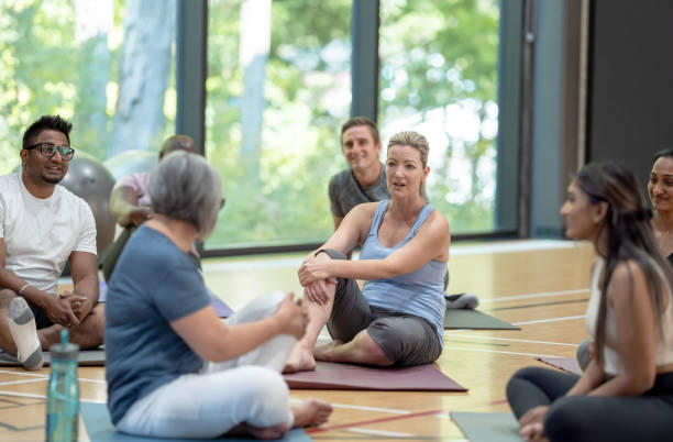 istock Yoga class attendees get to know each other 1346275774