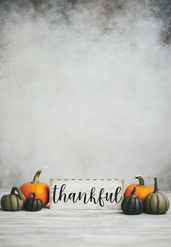 Thankful Message for Thanksgiving with Small Pumpkins in Gray Setting