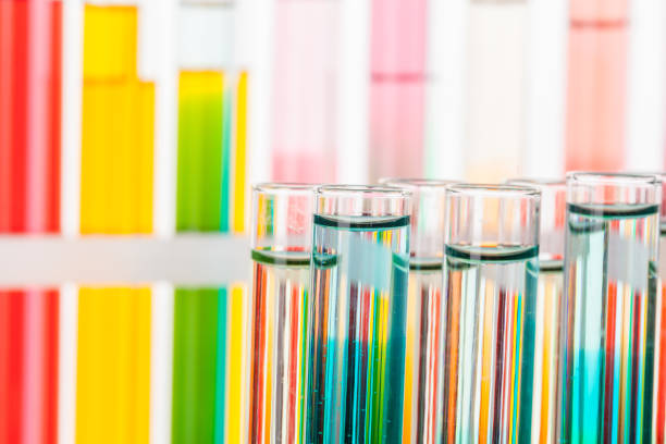 istock Glass laboratory chemical test tubes with liquid for analysis close up 1346281135