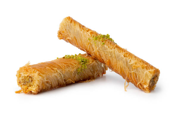 istock Turkish sweet pastry baklava isolated on white background 1346282609