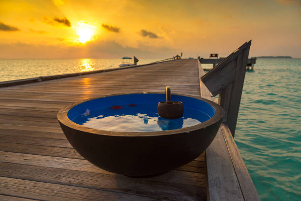View of wooden deck in diminishing perspective view over Caribbean sea.