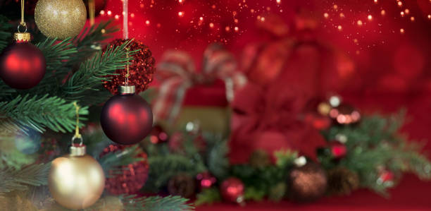 istock Christmas Tree and Gifts on a Red Background 1346287225