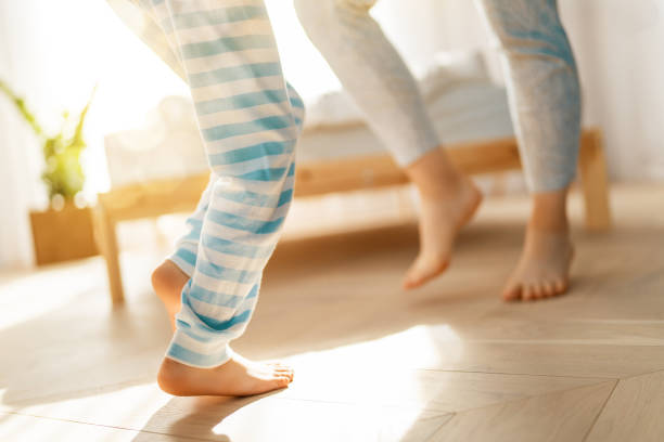 istock Mom and her daughter are dancing. 1346288189