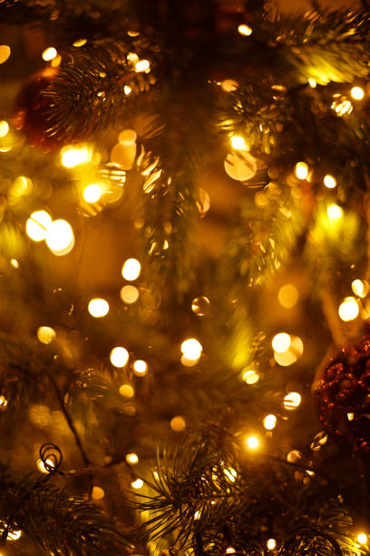 istock Soft focus festive Christmas tree blurred background 1346289144