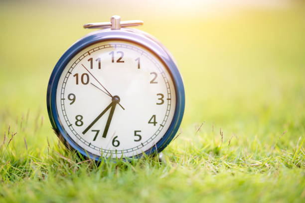 istock Retro alarm clock with copy specs for background 1346293146