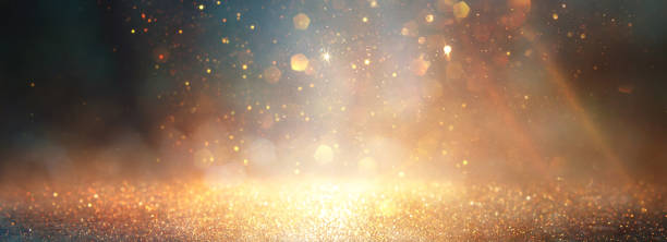 istock background of abstract glitter lights. gold, blue and black. de focused 1346294018