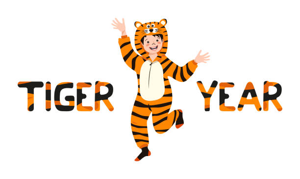 istock Boy in tiger carnival costume and inscription New Year 1346295739