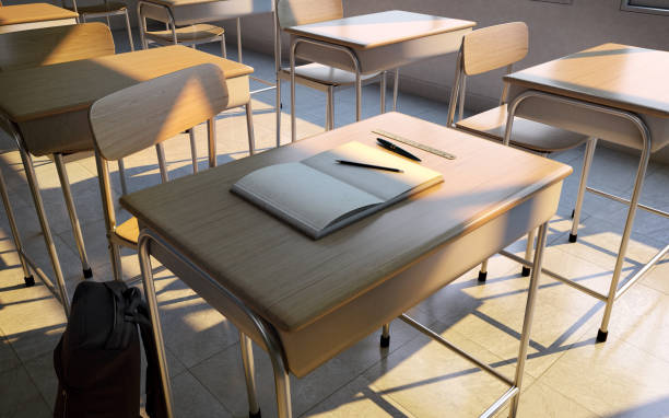 istock Tables and chairs in the classroom with notebook,pencil and ruler.3d rendering 1346295871