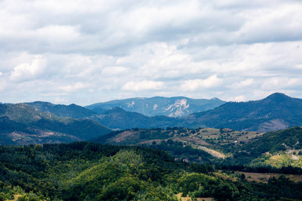 istock View to mountain and forest with cloudy sky 1346297710