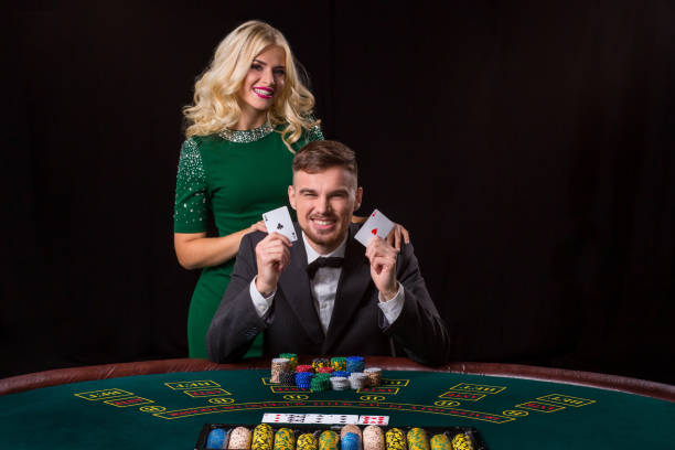 istock Poker player showing a pair of aces 1346298698