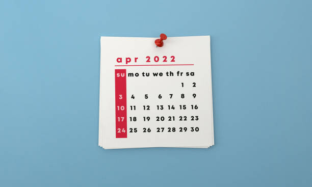 istock 2022 Post It April Calendar on Blue Background 1346302124