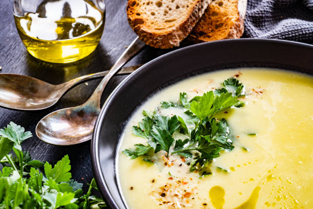 istock Creamy zucchini soup on wooden table 1346303112