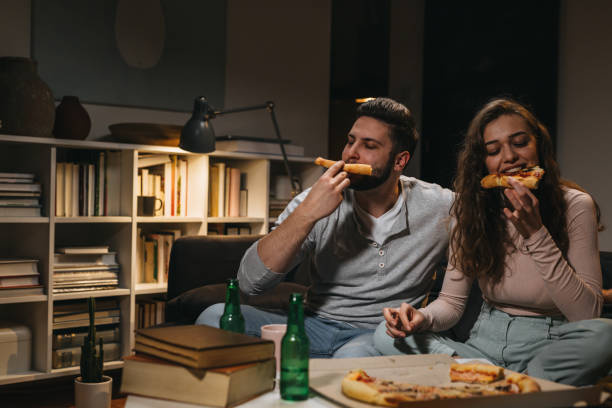 istock friends at home, night scene 1346303212