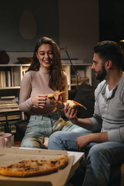 istock friends at home, night scene 1346303226