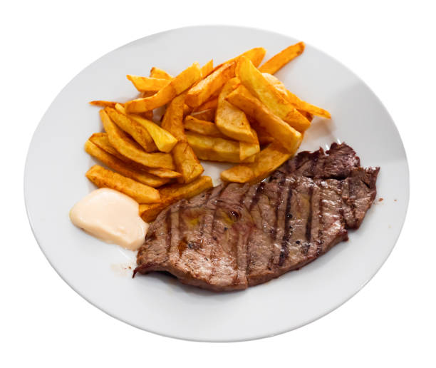 istock Delicious roasted veal chop served with potato 1346308501