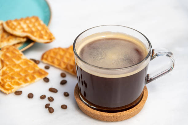 istock Fresh americano coffee in glass coffee cup on marble table 1346309702