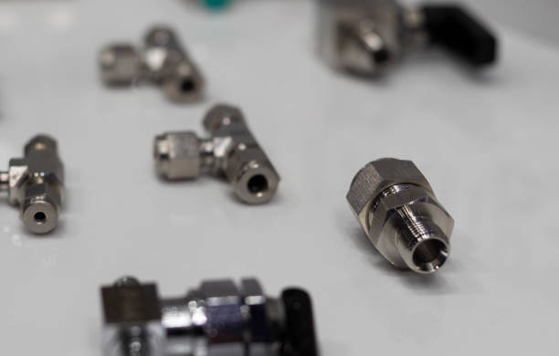 istock Industrial metal pipe connectors, adapters ; engineering background 1346310093