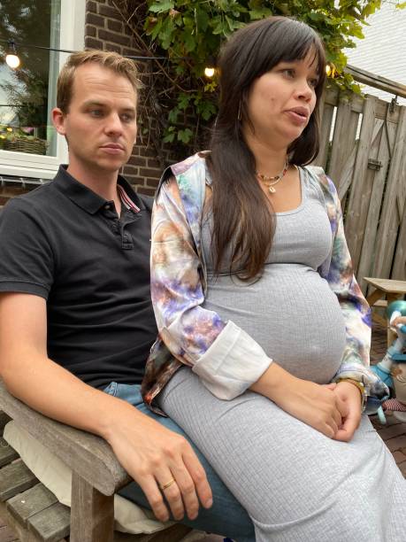 istock Happy pregnant couple 1346312300