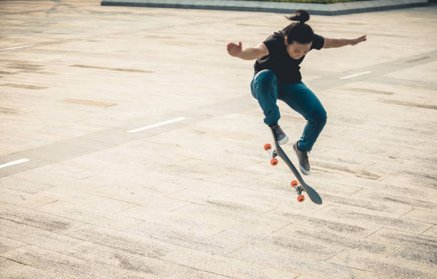 istock Skateboarder skateboarding outdoors in city 1346312329