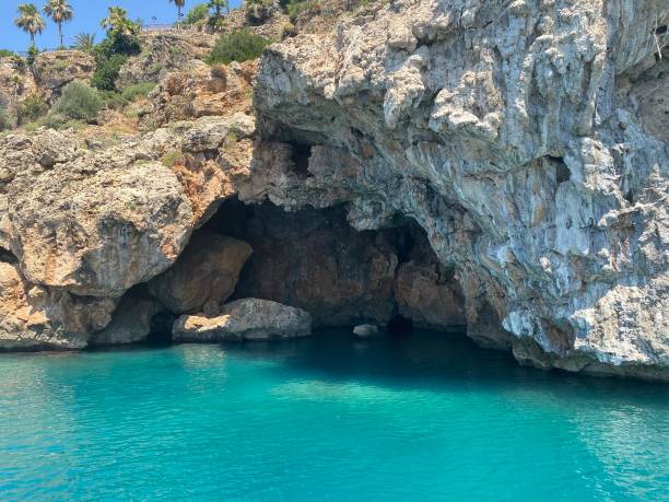 istock Cave seen from the sea 1346313216