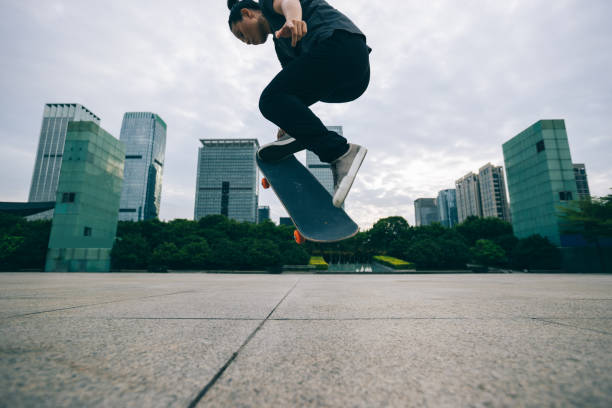 istock Skateboarder skateboarding outdoors in city 1346313387