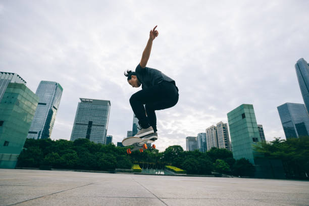 istock Skateboarder skateboarding outdoors in city 1346313411