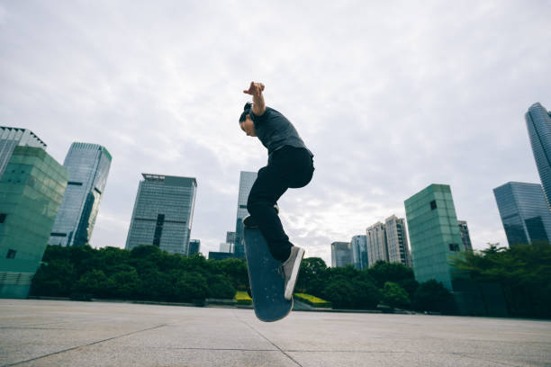 istock Skateboarder skateboarding outdoors in city 1346313425