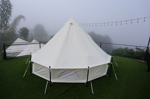 White tents for tourists. Relax and enjoy the atmosphere thick fog on Khao Kho, Thailand.