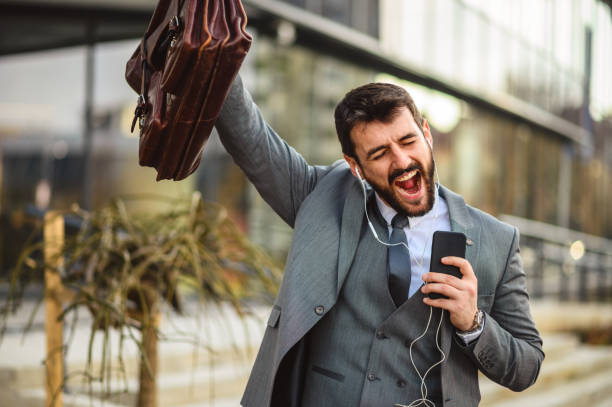 istock Businessman enjoying music 1346321191