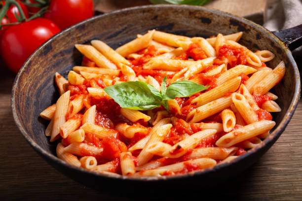 istock pan of pasta with tomato sauce 1346322088