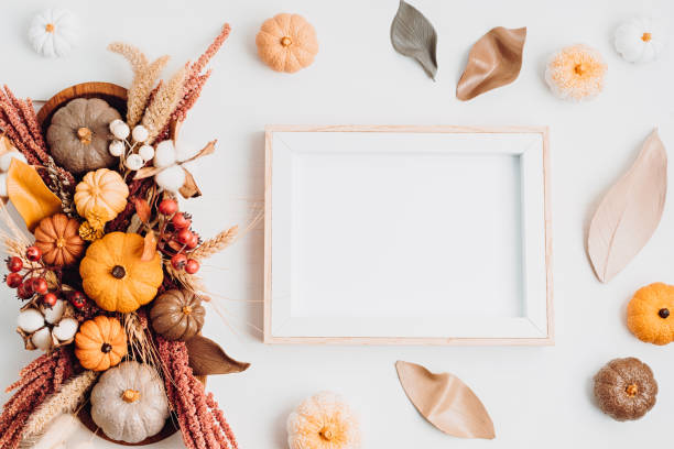 istock Rustic mockup with autumn table decoration. Floral interior decor for fall holidays 1346323527