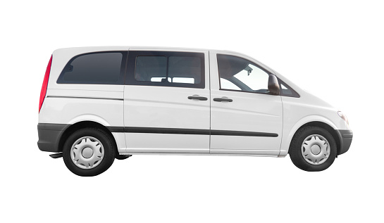 White delivery van or minibus with copy space for advertising, with clipping path