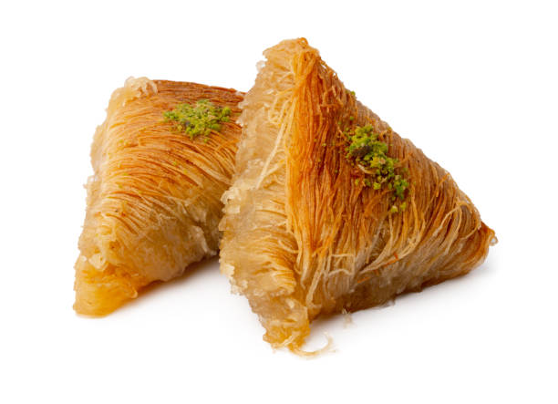 istock Delicious sweet baklava isolated on white background 1346331009