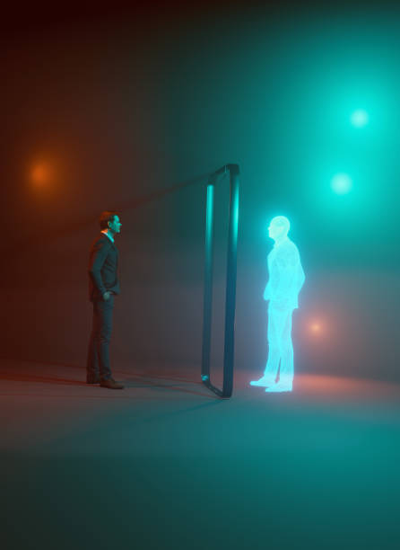 istock Man looks his own digital clone in the eyes through a frame 1346335974