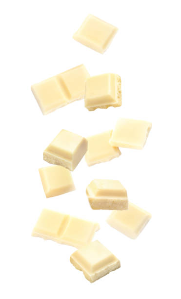 istock Delicious chocolate pieces falling on white background 1346339290